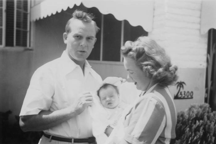Mike Young as a baby with his parents, Lloyd and Mildred, in 1949