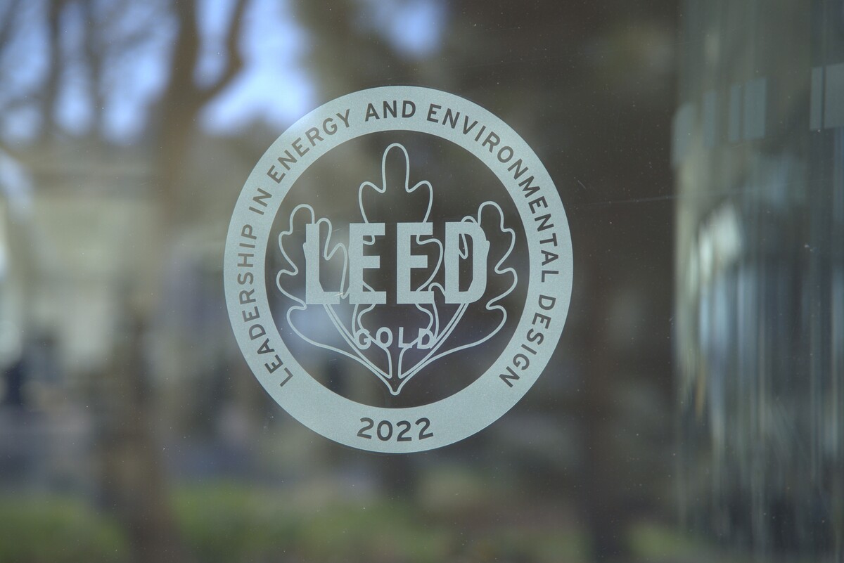 LEED certification logo on side of building