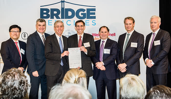 Building bridges: (From left to right) Augustine M.K. Choi, Craig B. Thompson, Richard P. Lifton, Andrew Plump, Carl S. Goldfischer, James E. Flynn, and Michael Foley join to launch Bridge Medicines (Photo by Studio Brooke.) 