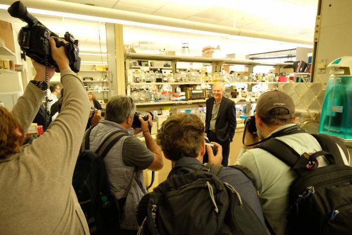 Michael W. Young poses in his laboratory on the morning of the Nobel announcement.