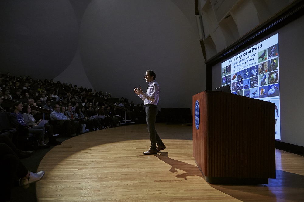 Erich Jarvis speaking to high school students in Caspary Auditorium. 