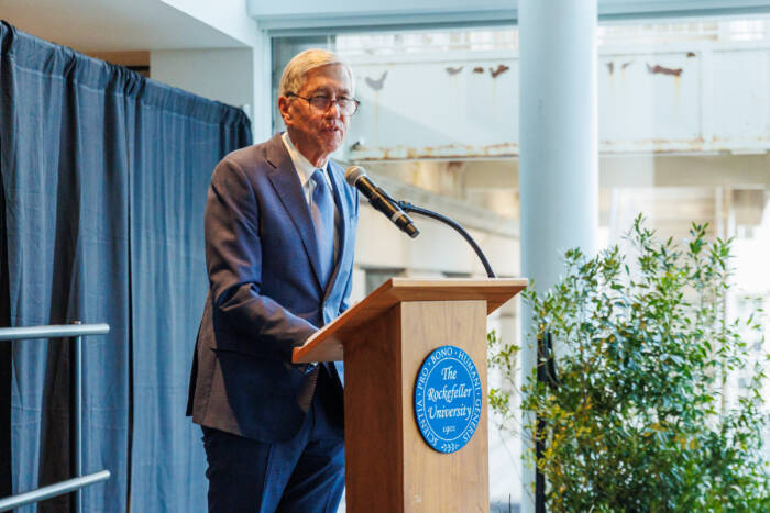 Richard P. Lifton at a podium during the employee Anniversary Retirement Event