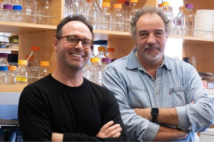 Ryan Notti (left) and Thomas Walz (right) standing in their lab