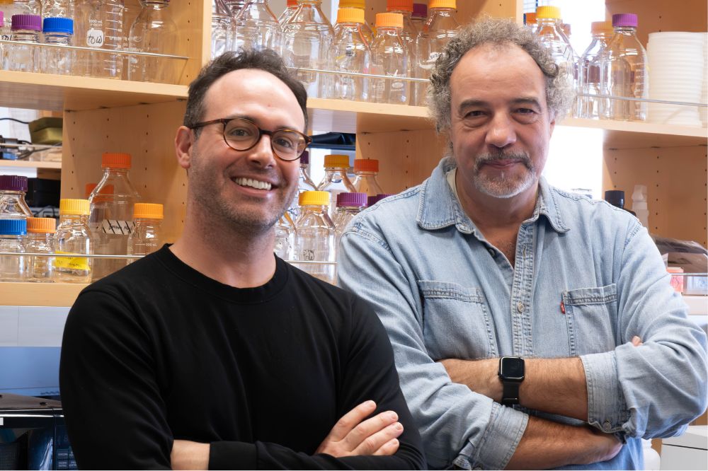 Ryan Notti (left) and Thomas Walz (right) standing in their lab