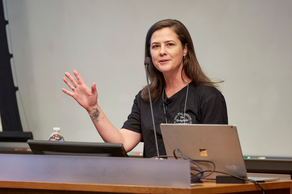 Garbarino introducing a speaker at Talking Science, one of RockEDU's signature events.