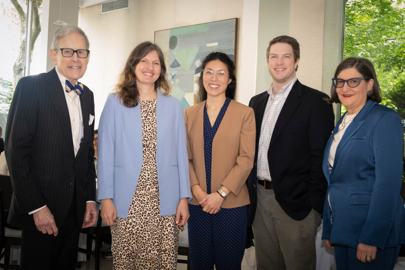 From left to right: Barry Coller (co-director), Laura Berneking (chief scholar 2026 to 2027), Julia Wu (chief scholar 2025 to 2026), Neil Neumann (chief scholar 2026 to 2027), and Sarah Schlesinger (co-director). (Credit: Lori Chertoff)