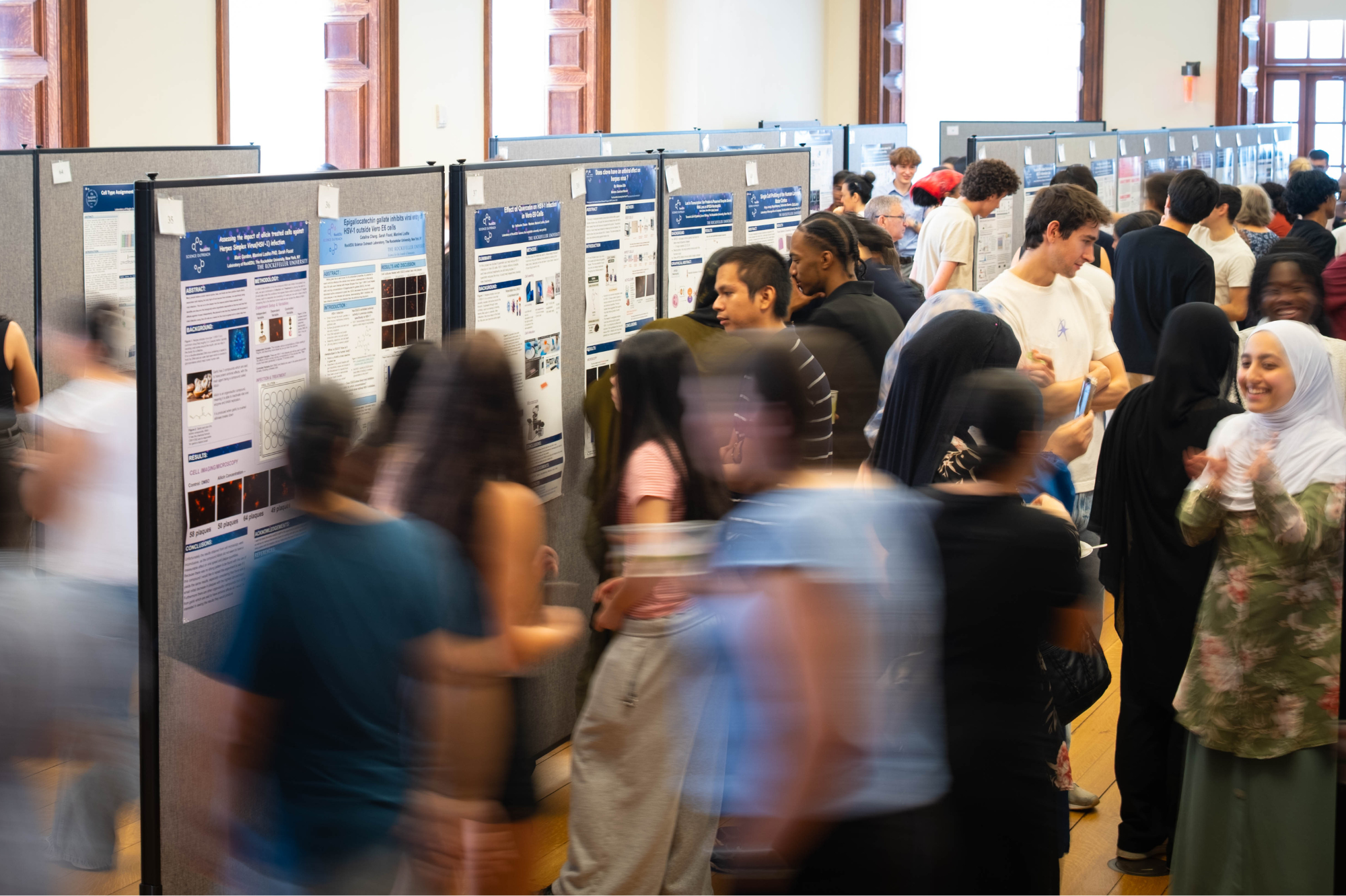 The annual poster session featuring work from SURF participants, alongside students from Rockefeller’s Summer Science Research Program, always draws a vibrant crowd. (Credit: Lori Chertoff) 