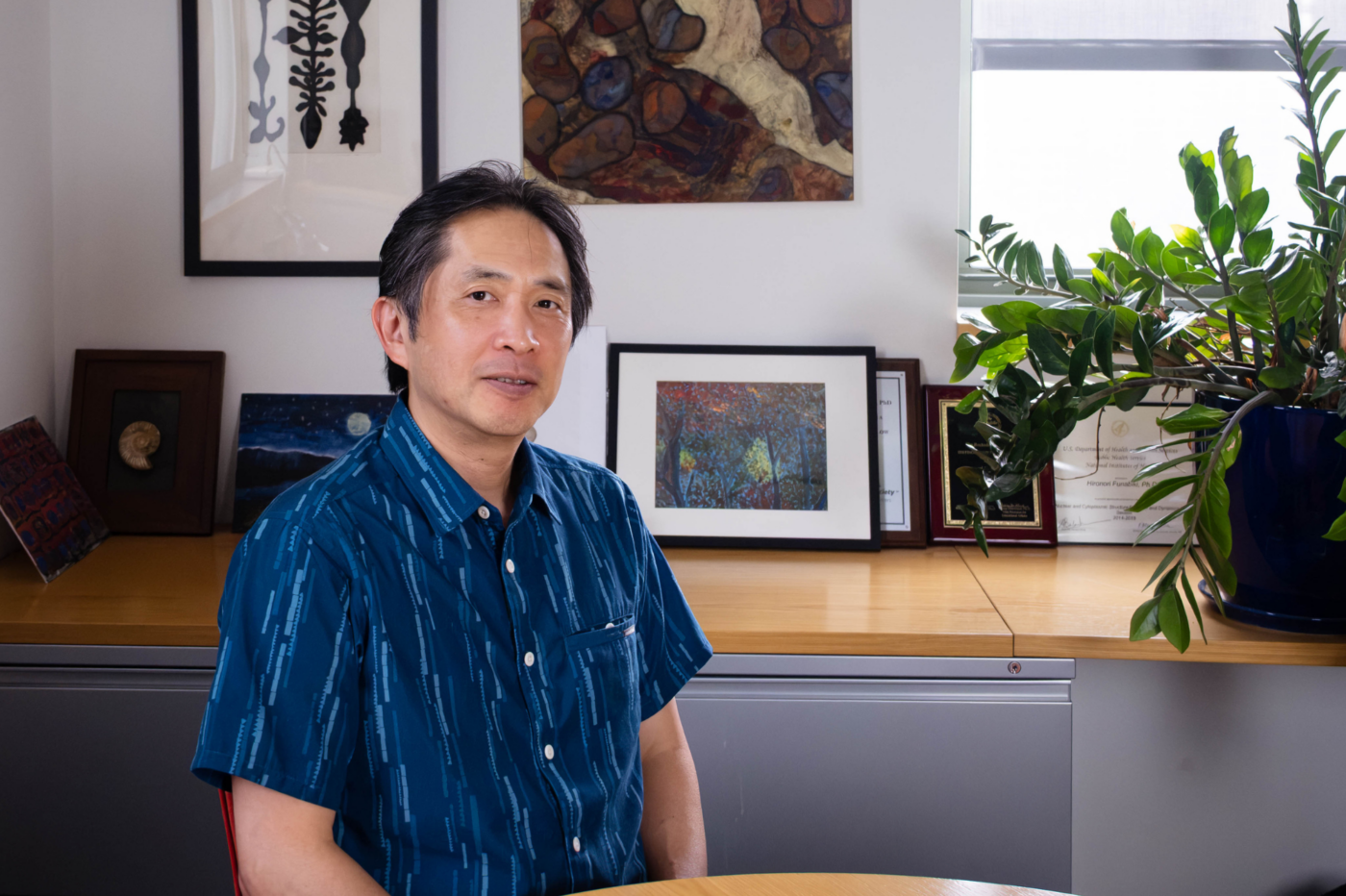 Hironori Funabiki studies how the chromosomes containing all our DNA are copied and maintained. (Credit: Lori Chertoff) 