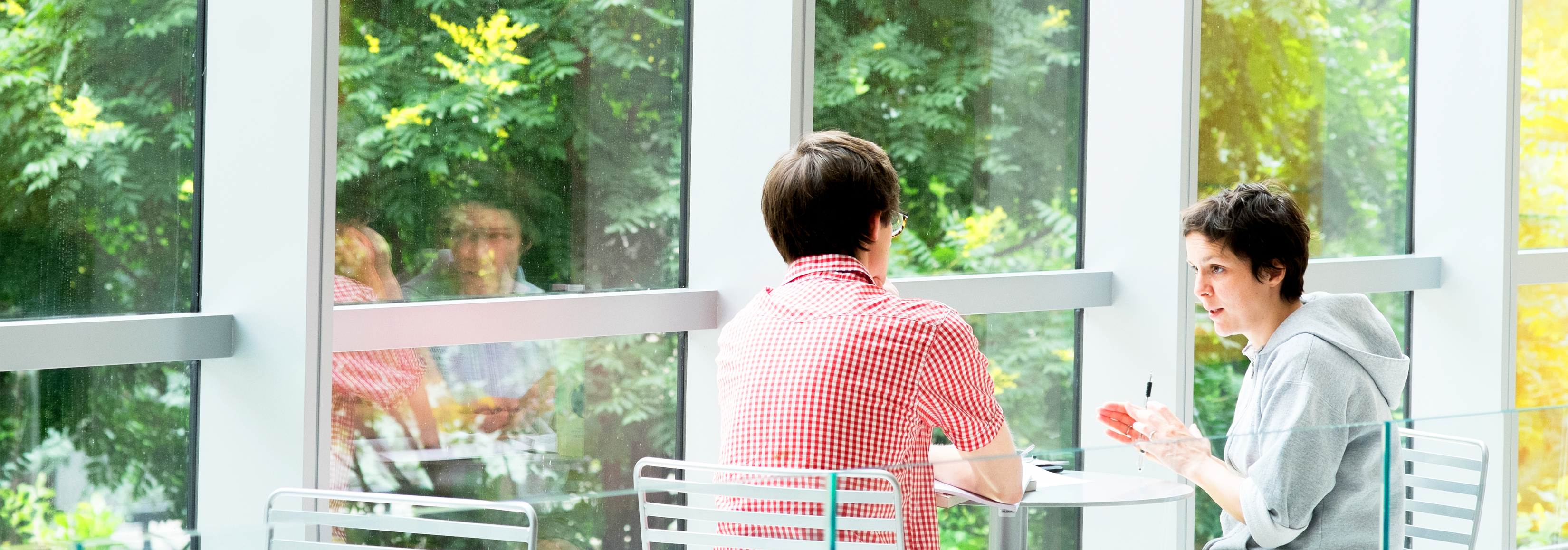 Students in discussion in the Greenberg building