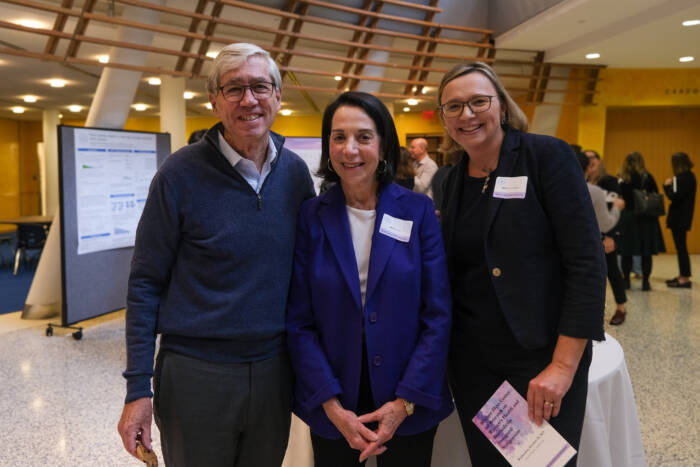 President Richard P. Lifton (left), Trustee Marlene Hess (center), and Director Agata Smogorzewska (right) attend the inaugural Hess Center Symposium.