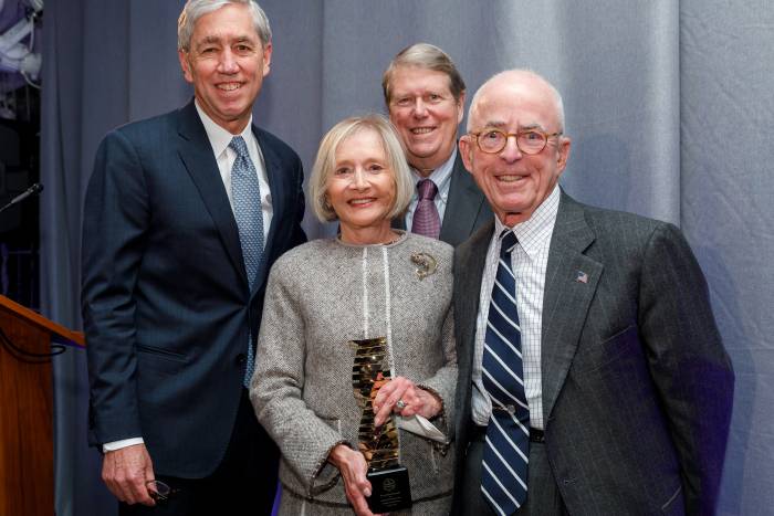 Pat and John Rosenwald (front) accepting the 2018 Enlightened Philanthropy Award from Rick Lifton (back left) and Russ Carson