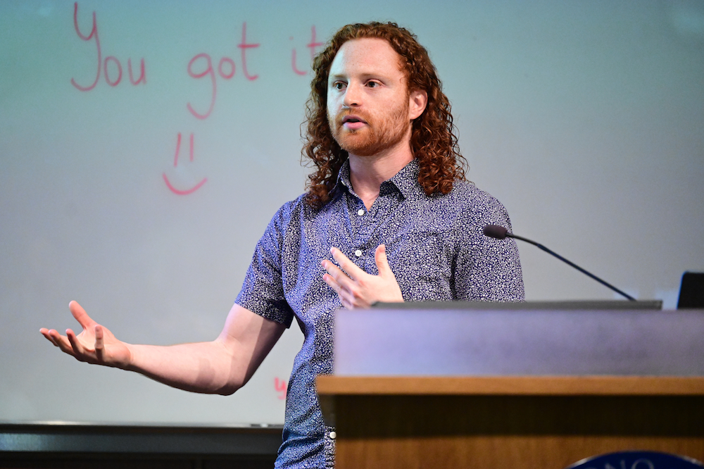 More than two dozen blitz presentations showcased campus research projects at the first-ever Neuroscience Jamboree. Postdoc Silas Busch, one of the participants, pictured here. (Credit: Chris Taggart)