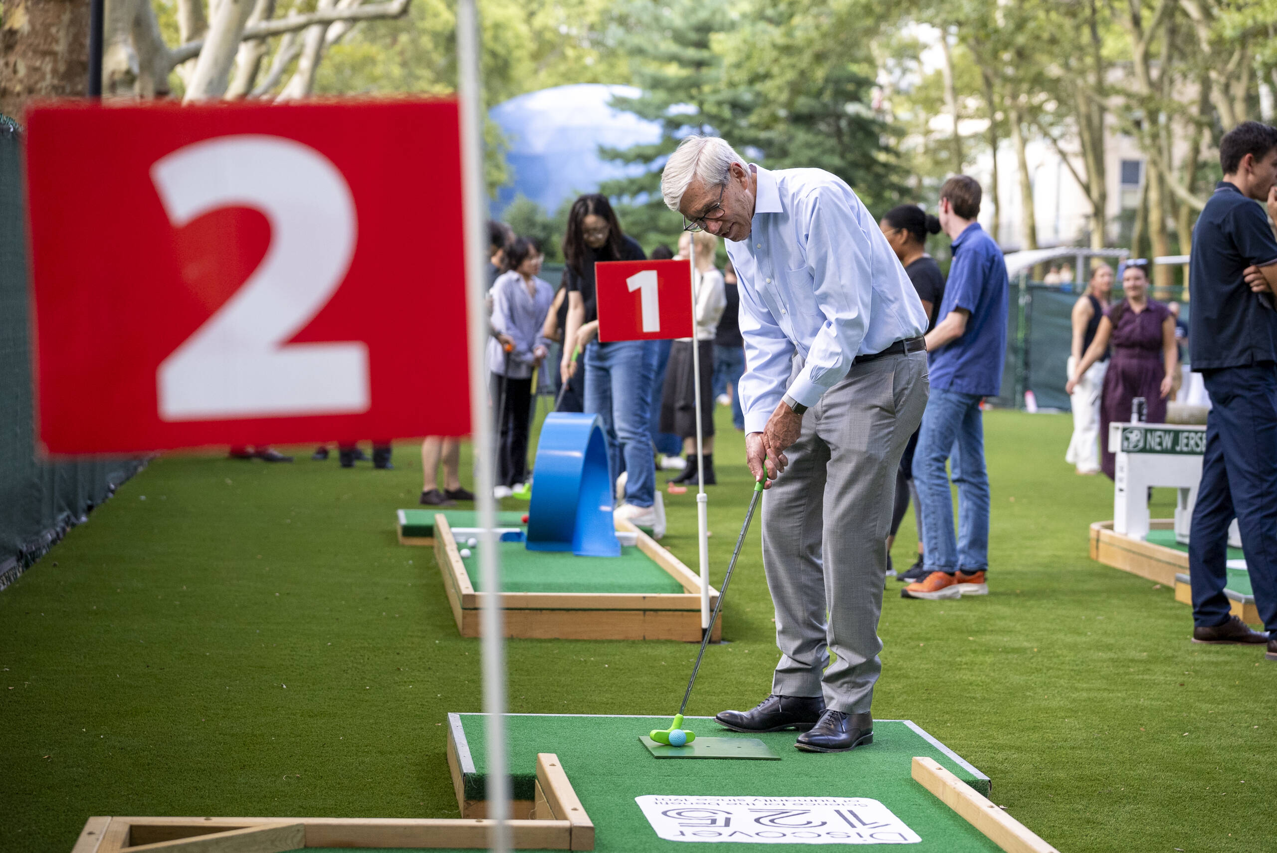 Rick Lifton joining in a round of mini golf