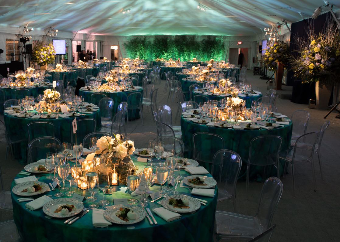 Guests enjoyed a beautiful dinner under a tent on the campus esplanade